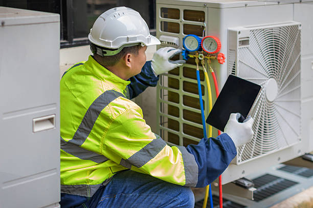 Professional Hvac technician working in Cambridge, MD